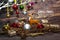 Balls colorfull christmas ornaments hanging from christmas tree on wooden board