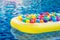 Balls on the float, floating tires, bright, summer toys, vacation, fun