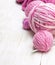 Balls of pink yarn