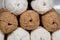 Balls of white and beige wool abstract background