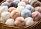 Balls of wool in pastel colors, in a basket, for making warm clothes and warm accessories. Winter time. AI generated