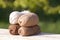 Balls of wool in shades of natural tones on old wood