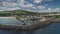 Ballycastle port cityscape aerial timelapse, hyperlapse view: houses, ships, yachts, boats at ocean