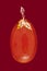 Baltic amber closeup on red background