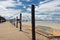 Baltic Sea beach with fencing and parking for bicycles