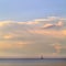 Baltic Sea landscape with a lonely sailboat - Gdynia, Poland