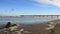 Baltic Seashore With Sea Wave And Long Bridge With Foam