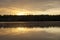 Baltis Lake Orange Sunset With Reflections