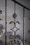 Baluster wrought iron detail with a sunflower