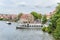 Bamberg, Germany. Tourist boat departs from the pier on the waterfront Am Cranen