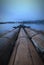 the bamboo bridge floats over the lake accompanied by fog in the morning