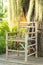 Bamboo chairs on the wooden floor.