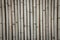 Bamboo fence texture background. Bamboo wall background. Dry bamboo texture exactly vertically straight wall floor light. Eco natu