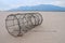 Bamboo fishing net beached on sand on the Mekong River, Laos, Asia