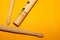 Bamboo flute and drumsticks. simple music instruments