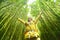 Bamboo forest nature woman environment freedom with open arms in success. Environmental eco friendly sustainability