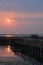 Bamboo pier at sunset