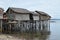 Bamboo poles support the stilt Bajau shanty houses built by indigenous people in the Philippines.