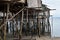 Bamboo poles support the stilt Bajau shanty houses built by indigenous people in the Philippines.