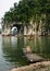 A bamboo raft in front of Elephant Trunk Hill