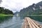 Bamboo raft heading on lake