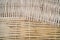 Bamboo sticks wooden background with thread uniting