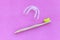 bamboo tooth brush. Dental Bleaching System. Teeth Whitening Accelerator. Flat lay composition space for text on pink