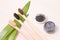 bamboo toothbrushes on a wooden table, a bunch of charcoal