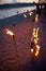 Bamboo torches. night lit torch on the beach