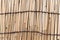 Bamboo wall with brown rope close up view