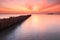 Bamboo wall in the sea and beautiful sunrise at Saphan Hin,