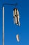 Bamboo wind chimes against a blue sky