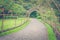 Bamboo wooden tunnel walkway or footpath in public park.