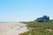 Bamburgh castle and beach on hazy summer day