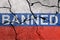 Ban for Russia. Flag of Russia painted on concrete wall with word BANNED