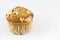 Banana almond muffin on white tablecloth