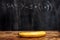 Banana by blackboard with equation