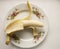 Banana bunch and peeled pieces photo Tropical fruits,