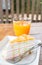 Banana caramel crepe cake and fresh orange juice