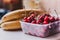 Banana and cherries on the windowsill