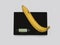 Banana on a digital white kitchen scale.