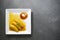 Banana flambee popular dessert on simple modern background