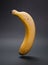 Banana floating isolated on darrk background