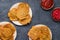 Banana Fritters on plates with coloured napkins