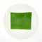 Banana leaf on blank plate