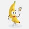 Banana logo mascot with selfie pose