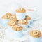 Banana muffin, cupcakes in blue cake cases paper, side view, white concrete table