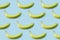 Banana pattern on blue background, top view