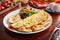 Banana peanut omelette roll served in a dish isolated on wooden background side view