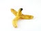 banana peel isolated on white background, sign idea beware slip